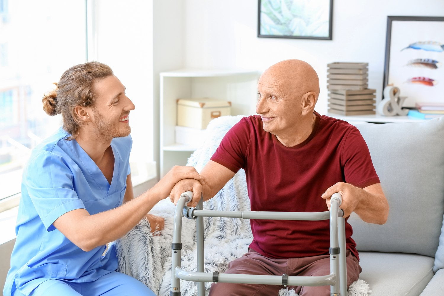 NDIS Support Worker helping old man.